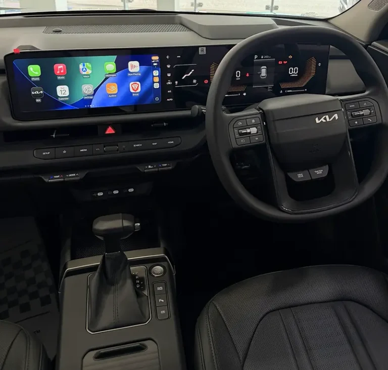 2027 Kia Seltos dashboard and driving controls at the Phillip Street, Port of Spain showroom