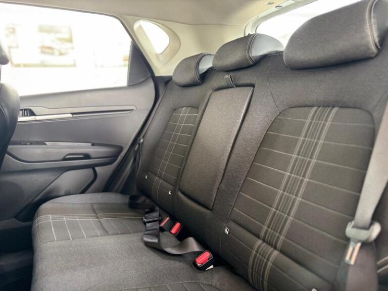 Kia Sonet rear seats with dark fabric upholstery and three headrests